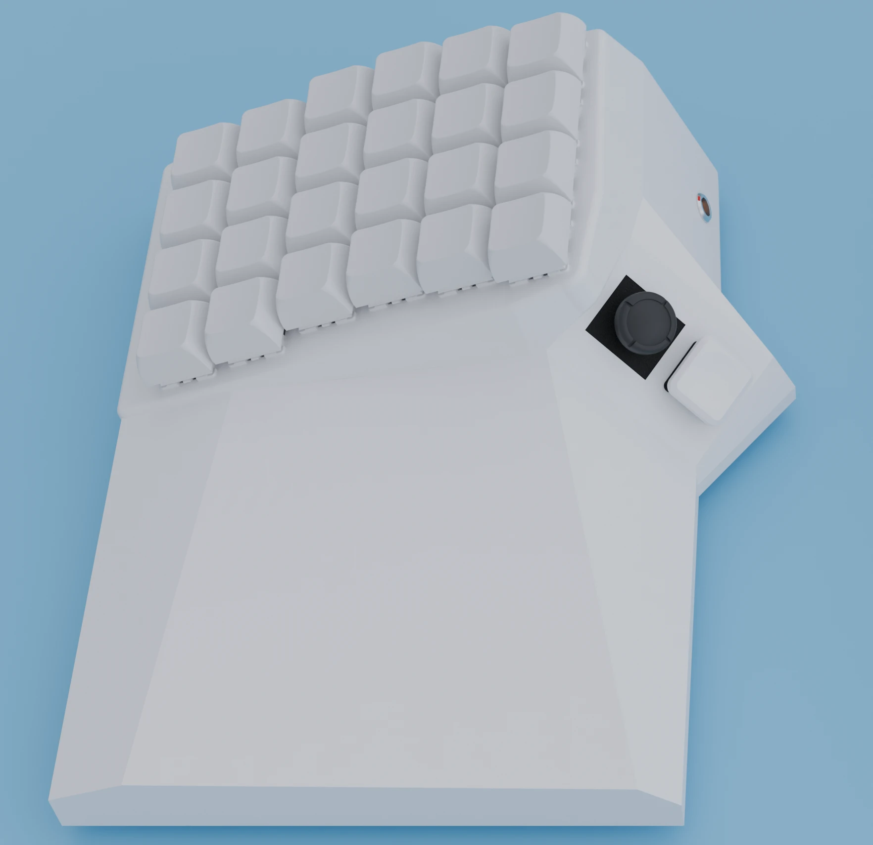 Left half of the OS Keyboard, showing the thumb joystick and side button